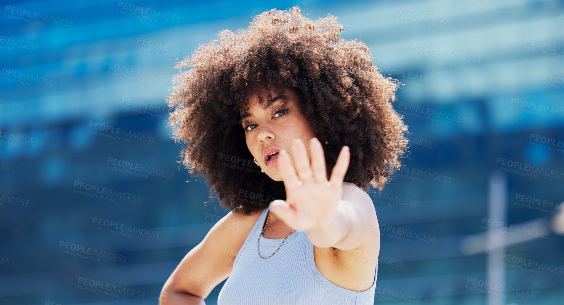 Buy stock photo Fitness, dance and black woman in urban city with energy, hand moving and energy portrait of gen z youth. Natural hair, afro and workout, exercise or hip hop person or model on blue building