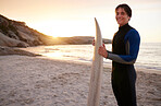 Surfer, surf and portrait of teenager with surfboard at the beach, sea and ocean in sunset with mockup space. Young, ready and male in swimsuit on a sunny day on the sand, shore and water in summer