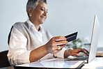 Businesswoman, credit card and laptop for ecommerce, finance or accounting investment in office. Closeup of worker, budget and financial payment on computer, fintech trading or digital online economy