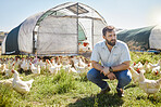 Man on farm, chicken and agriculture, thinking about livestock agro business and sustainability, organic poultry outdoor. Vision, farmer and mindfulness, animal farming and look at countryside view