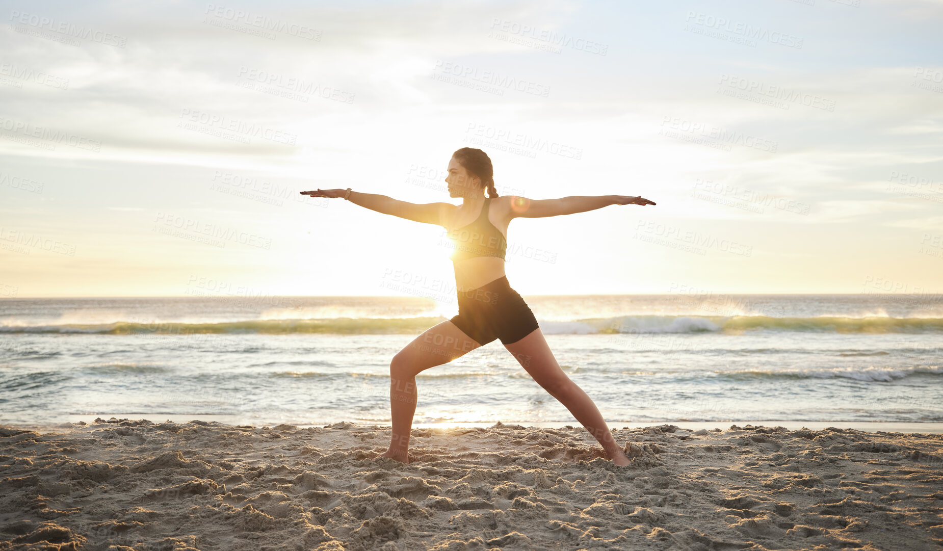 Buy stock photo Woman, yoga and meditation on the beach for zen, spiritual wellness or workout in the sunset outdoors. Female yogi meditating in warrior pose for calm, peaceful mind or awareness by the ocean coast