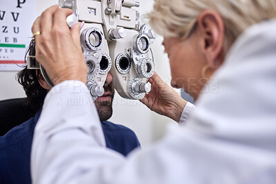 Buy stock photo Doctor with customer in vision test or eye exam for eyesight by doctor, optometrist or ophthalmologist. Senior optician helping check retina health of a man, patient or client with medical insurance