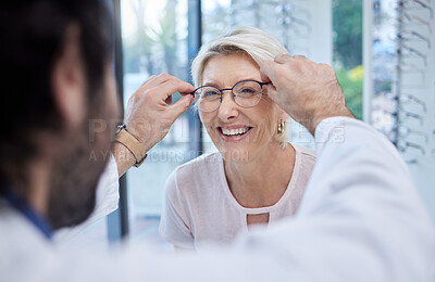 Buy stock photo Optometrist, glasses and woman with smile in store for vision, eyesight and optical lenses. Happy customer face, frames and lenses for eye care test, consulting and retail shop services for wellness