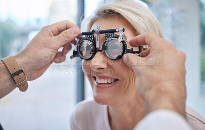Buy stock photo Hands, help or woman in eye exam or vision test for eyesight by doctor, optometrist or ophthalmologist. Optician helping a happy customer to see or check glaucoma or retina health in a consultation