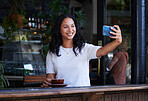 Woman at cafe, smile in selfie with smartphone, social media post with lifestyle or food influencer with coffee. Tech, phone photography and happy in picture, brand promotion for online community 