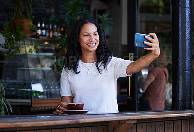 Buy stock photo Woman at cafe, smile in selfie with smartphone, social media post with lifestyle or food influencer with coffee. Tech, phone photography and happy in picture, brand promotion for online community 