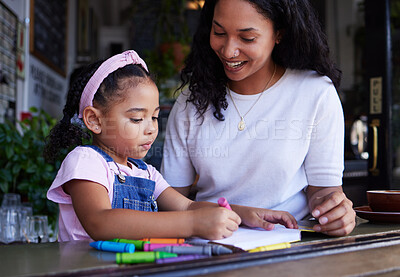 Buy stock photo Bonding, drawing and mother and child at a restaurant with art, creativity and color on paper. Creative, happy and girl learning to draw with her mom while eating at a cafe and waiting for food