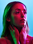 Model skincare, glowing or neon lighting on isolated blue background and hands on neck, body or skin. Beauty, thinking or woman touching in creative fantasy green, pink or lights aesthetic in makeup