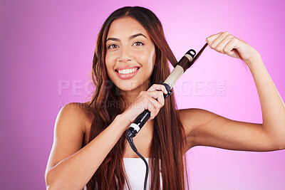 Buy stock photo Hair, curling iron and portrait of girl on purple background for wellness, cosmetics and beauty treatment. Salon aesthetic, hairdresser and face of girl with product for healthy, shine and hairstyle