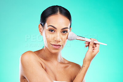 Buy stock photo Makeup, cosmetics and portrait of a woman with a brush isolated on a green studio background. Skincare, beauty and face of a model with foundation, powder or cosmetic facial product on a backdrop