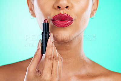 Buy stock photo Makeup, red lipstick or beauty with a model black woman in studio on a green background for a cosmetic product. Cosmetics, mouth and lips with a female indoor to apply color for a beautiful aesthetic