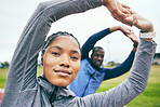 Portrait, black woman on field and stretching for fitness, workout and training for wellness, health and balance. Exercise, man and African American female athlete stretch arms, outdoor and practice