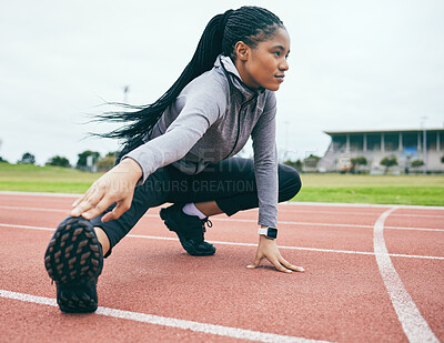 Fitness, exercise and black woman stretching legs for health and wellness at stadium outdoors. Winter sports, training runner and female prepare and get ready to start workout, running or exercising.