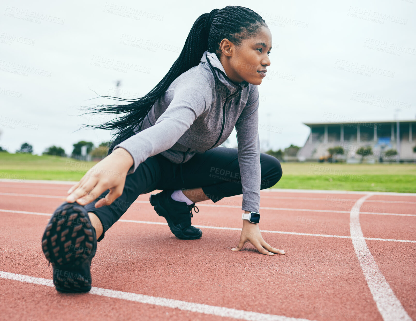 Buy stock photo Fitness, exercise and black woman stretching legs for health and wellness at stadium outdoors. Winter sports, training runner and female prepare and get ready to start workout, running or exercising.