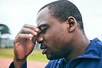 Headache, fitness and burnout with a sports black man holding his nose during an outdoor workout. Stress, exercise and mental health with a male runner or athlete training for cardio or endurance