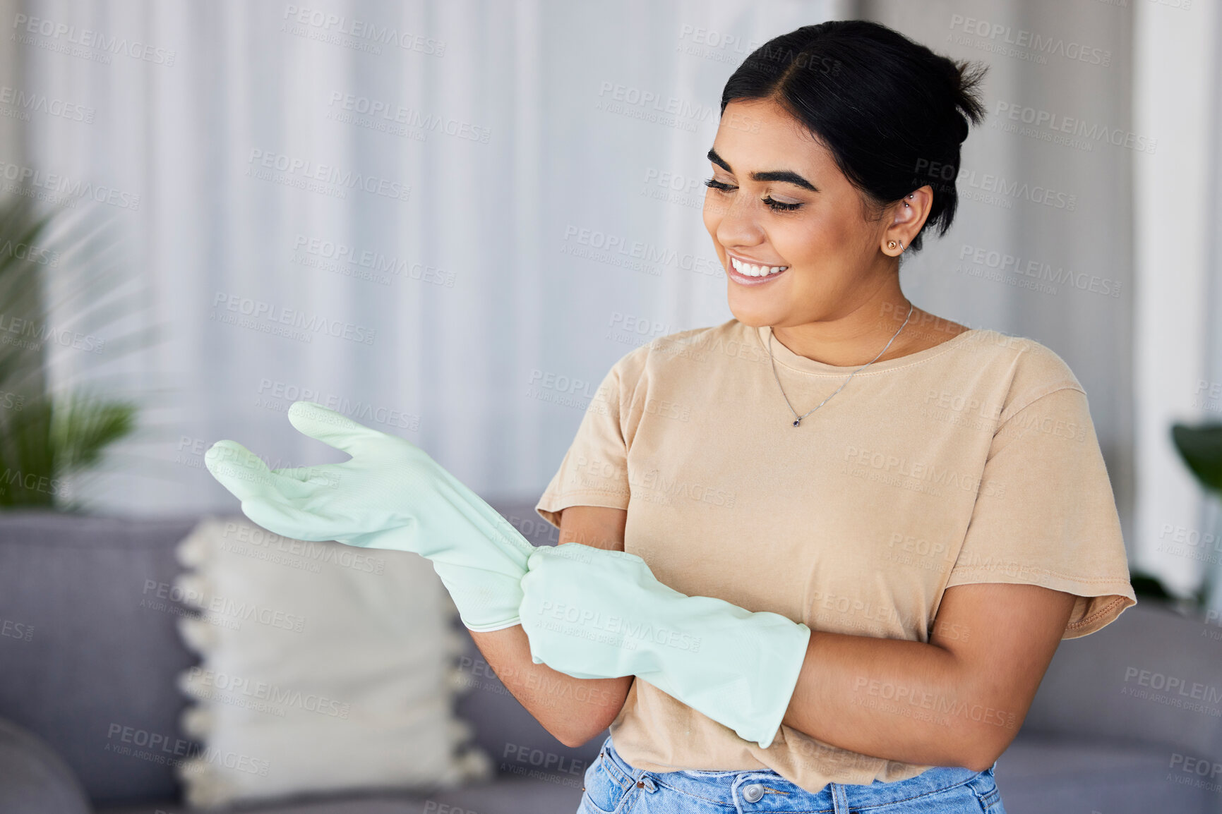 Buy stock photo Cleaning, woman and gloves on hands in home for housekeeping, maintenance and safety. Happy cleaner, housewife and smile in apartment while ready for domestic chores, services and dirt free lifestyle