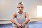 Gym portrait, woman focus and workout of a athlete sitting with a smile ready for sports. Wellness, health and fitness club with a young person with happiness and health motivation for sport