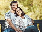 Love, happy and portrait of a couple in a park to relax, be calm and caring in Australia. Summer, freedom and carefree man and woman with affection, smile and happiness in nature for valentines day