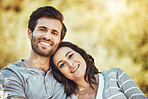 Love, care and portrait of a couple in a park to relax, be calm and happy in Australia. Summer, freedom and carefree man and woman with affection, smile and happiness in nature for a date together