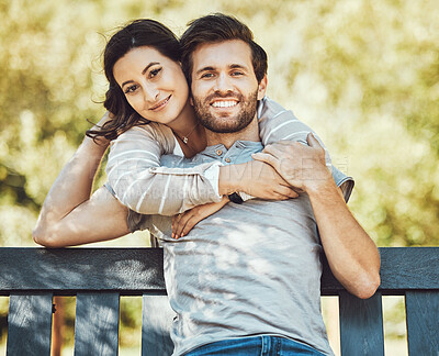 Buy stock photo Love, couple and hug on park bench, portrait and having fun time together outdoors. Valentines day, romance relax and care of man and woman hugging, embrace and cuddle on romantic date and smile.
