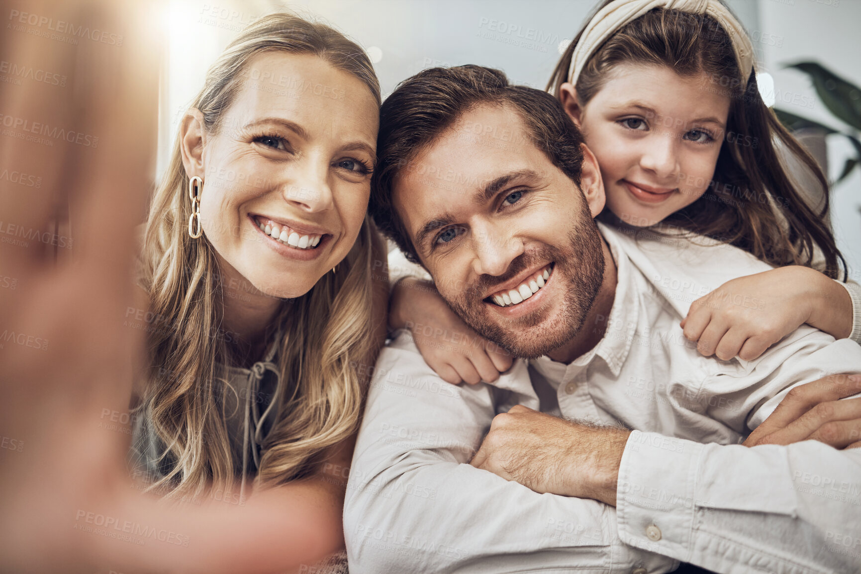 Buy stock photo Portrait, love or parents take a selfie with a girl as a happy family in house living room bonding in Australia. Mother, father or child relaxing with a smile enjoying quality time or taking pictures