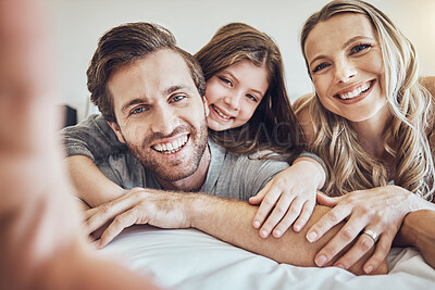 Buy stock photo Portrait, smile or parents take a selfie with a girl as a happy family in house bedroom bonding in Berlin. Mother, father or child relaxing together enjoying quality time or taking pictures at home