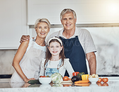 Buy stock photo Portrait, grandparents or child cooking as as happy family in a house kitchen with organic vegetables for dinner. Grandmother, old man and young girl bonding or helping with healthy vegan food diet