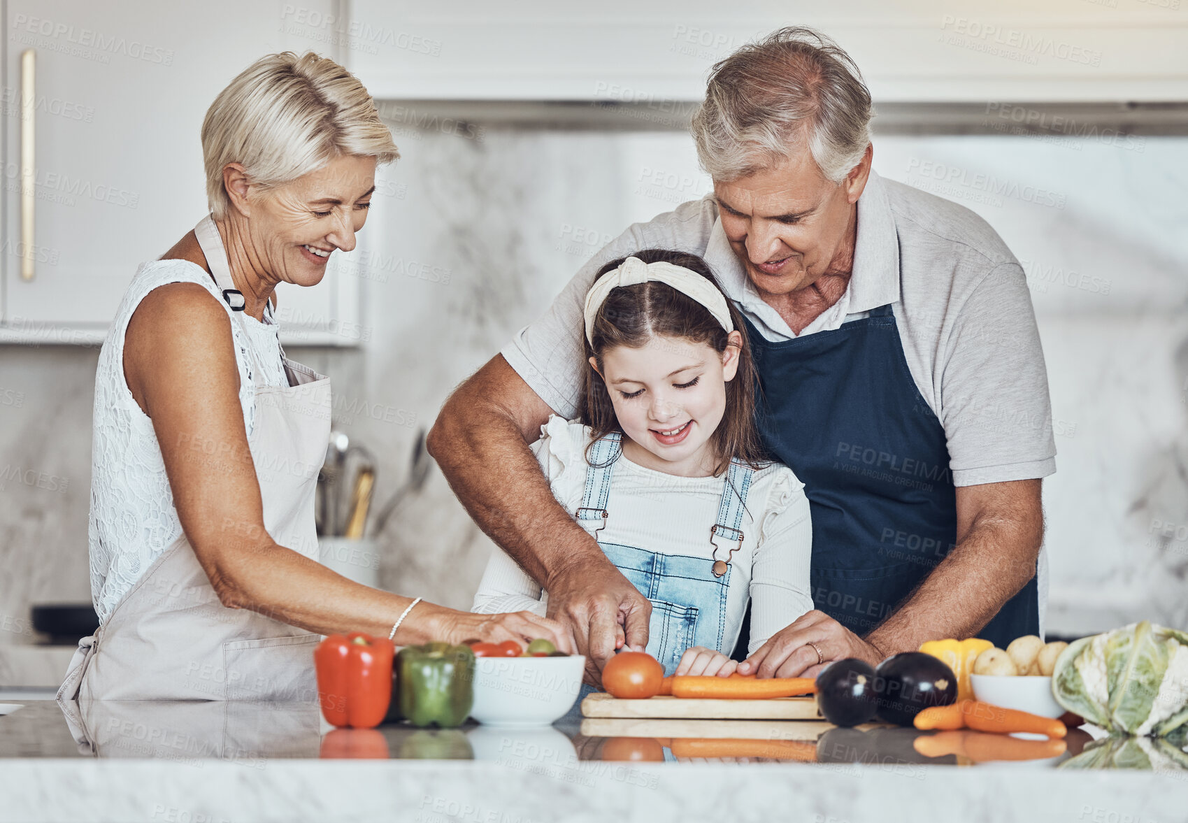 Buy stock photo Learning, grandparents or girl cooking as a happy family in a house kitchen with organic vegetables for dinner. Grandmother, old man and child helping or cutting carrots for a healthy vegan food diet