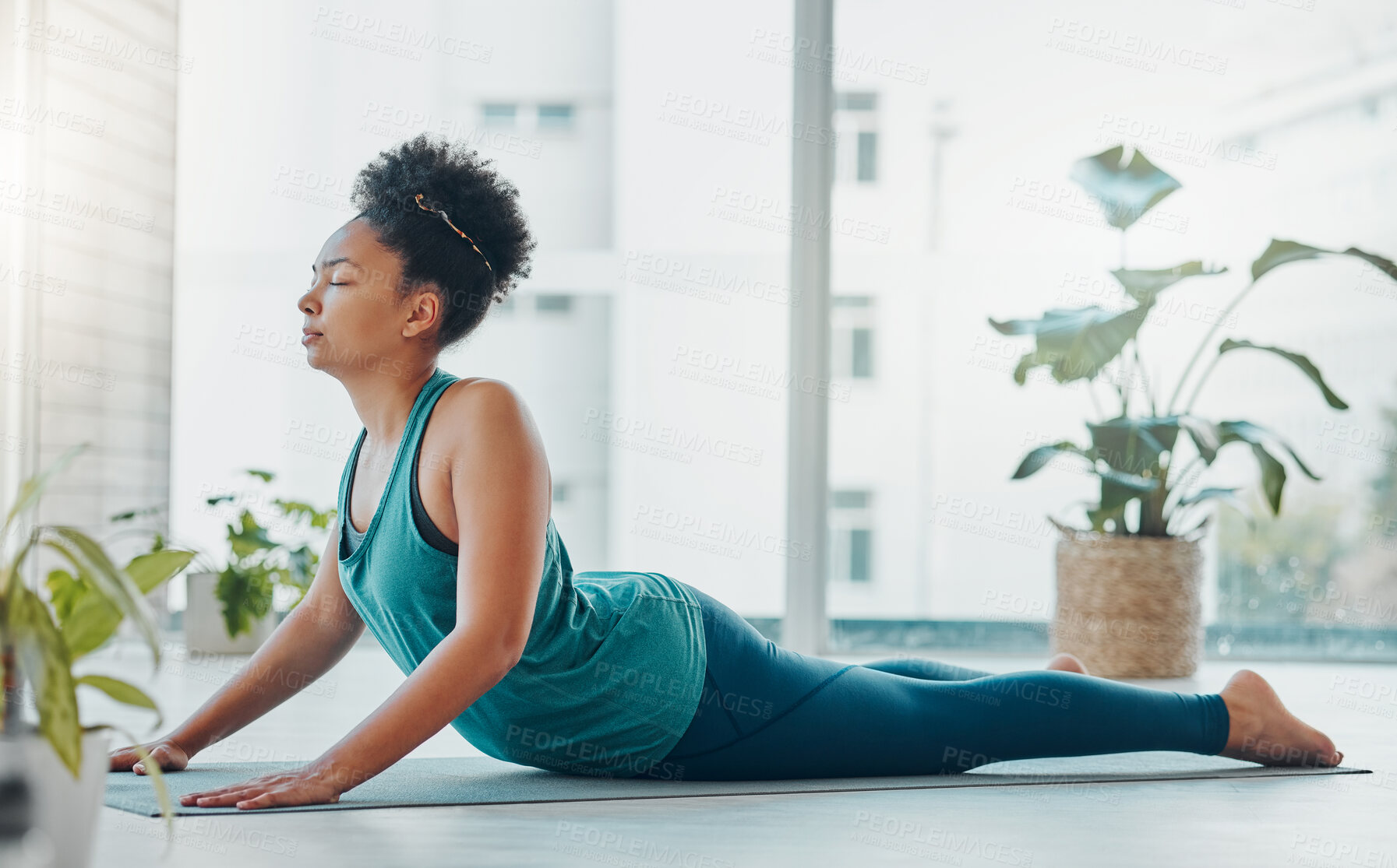 Buy stock photo Black woman, yoga and stretching exercise for fitness, peace and wellness. Young person in health studio for holistic workout, mental health and body balance with zen meditation energy on ground