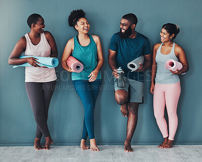 Buy stock photo Yoga, fitness friends and wall of pilates class in a gym with a exercise and training break. Talking, wellness black people and communication of group on a floor ready for zen, balance and relax