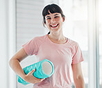 Portrait, yoga and fitness with a woman in studio for wellness, mental health or inner peace. Exercise, zen and chakra with a happy female standing in a gym for faith, mindfulness or spiritual health