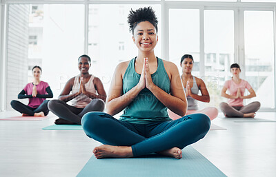 Buy stock photo Black woman, yoga portrait and meditation with zen exercise for fitness, peace and wellness. Instructor and diversity group in gym class for prayer hands holistic workout, mental health and body