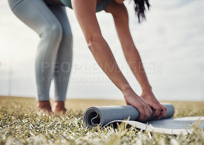 Buy stock photo Roll, yoga or woman in nature to start body training, exercise or workout on grass for zen mindfulness. Hands, fitness or healthy person rolling a mat for a peaceful or calm meditation in summer