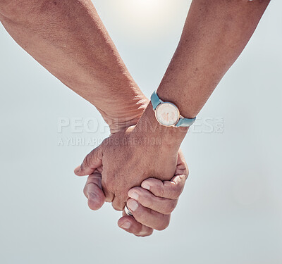Buy stock photo Couple holding hands with love on outdoor background for care, relationship or marriage support. Closeup hand of man, woman and people walking in nature, holiday and relax together on date of partner