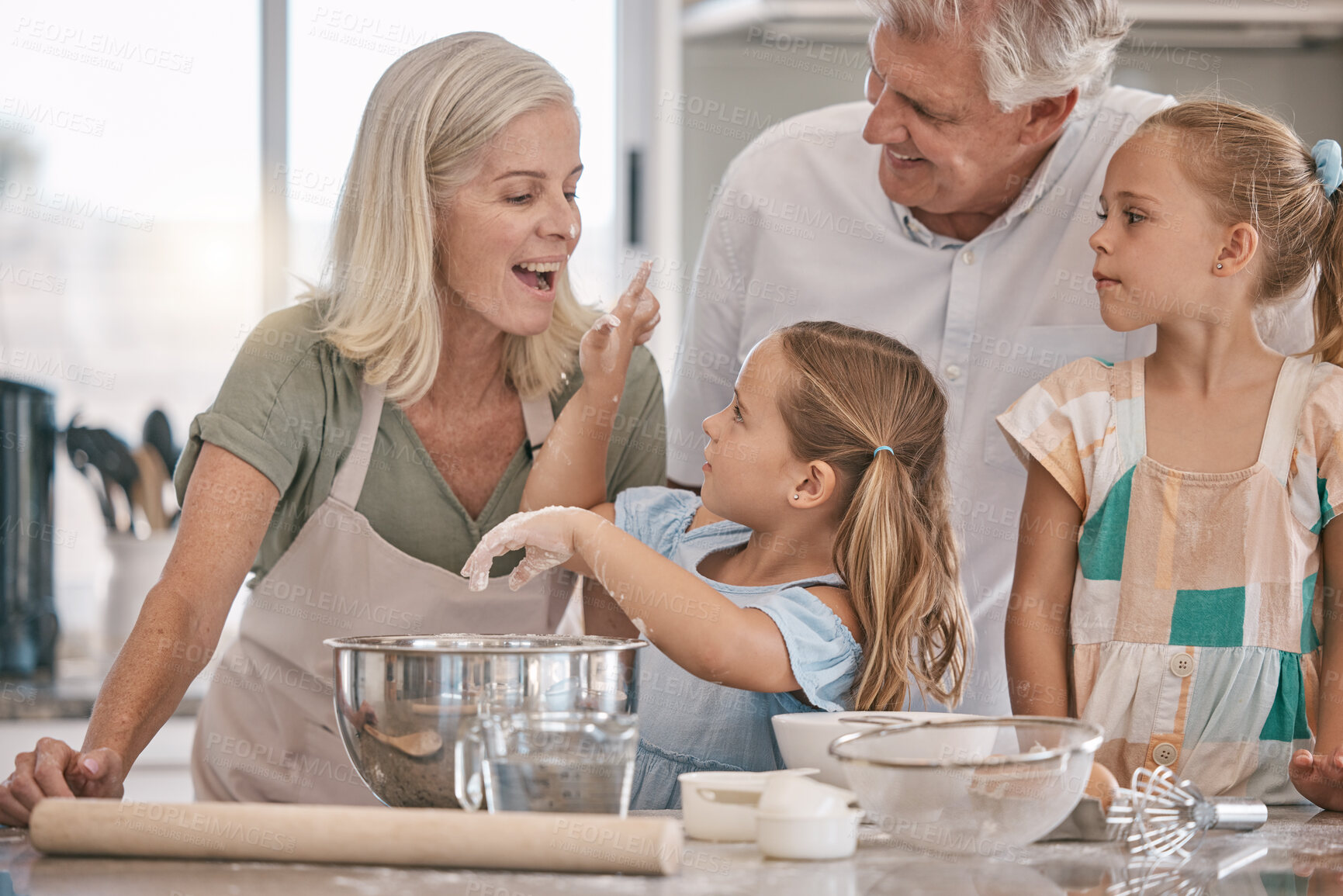 Buy stock photo Family, playful or baking children with flour wheat in kitchen, house or home of pastry cookies, dessert cake or food. Happy, grandparents or cooking kids playing, bonding or learning bakery pudding