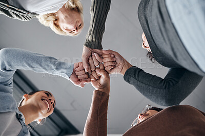 Buy stock photo People, hands and smile for fist bump below in trust, unity or collaboration together in solidarity. Hand of support group bumping fists in team agreement or coordination for community achievement