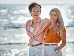 Couple on beach, lesbian and happy with sea, gay women hug outdoor with adventure and freedom to love. Interracial relationship, happiness in portrait and holiday in Australia, lgbtq and mockup