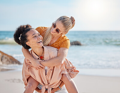 Buy stock photo Ocean, piggyback and happy couple of friends for lgbtq, lesbian or love and freedom on summer vacation together. Blue sky, beach and diversity women on date, fun support or excited valentines holiday