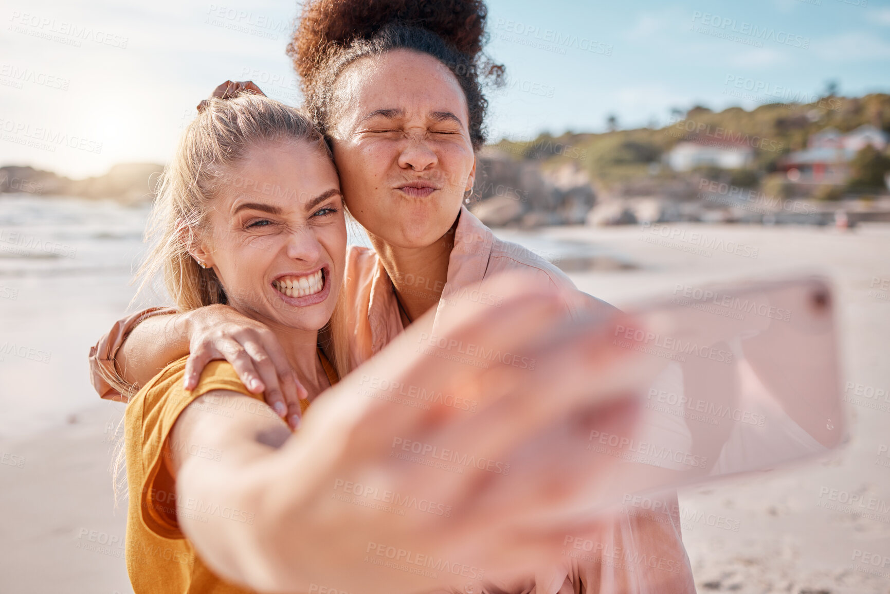 Buy stock photo Selfie, women and friends on beach, funny and summer vacation for break, bonding and playful together. Love, females or crazy ladies on seaside holiday, smartphone for pictures or memories of getaway