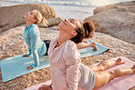 Yoga, relax and woman friends meditating on the beach together for mental health or wellness during summer. Exercise, diversity or nature with a female yogi and friend practicing meditation outside