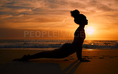 Buy stock photo Sunset yoga, stretching and silhouette of a woman at the beach for mindfulness training at night. Meditation, zen and girl beginning a pilates pose at the sea in the evening for spiritual exercise