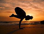 Yoga, silhouette or crows pose on sunset beach, ocean or sea for evening exercise, workout or relax training. Yogi, woman or balance on sand at sunrise for fitness, healthcare wellness or strong body
