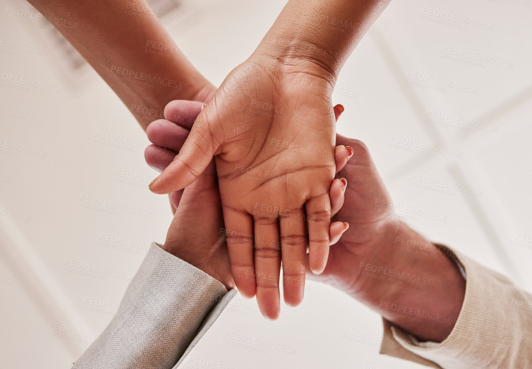 Buy stock photo People, hands together and unity below in trust for community, agreement or teamwork at the office. Group piling hand for team collaboration, support or coordination for corporate goals in solidarity