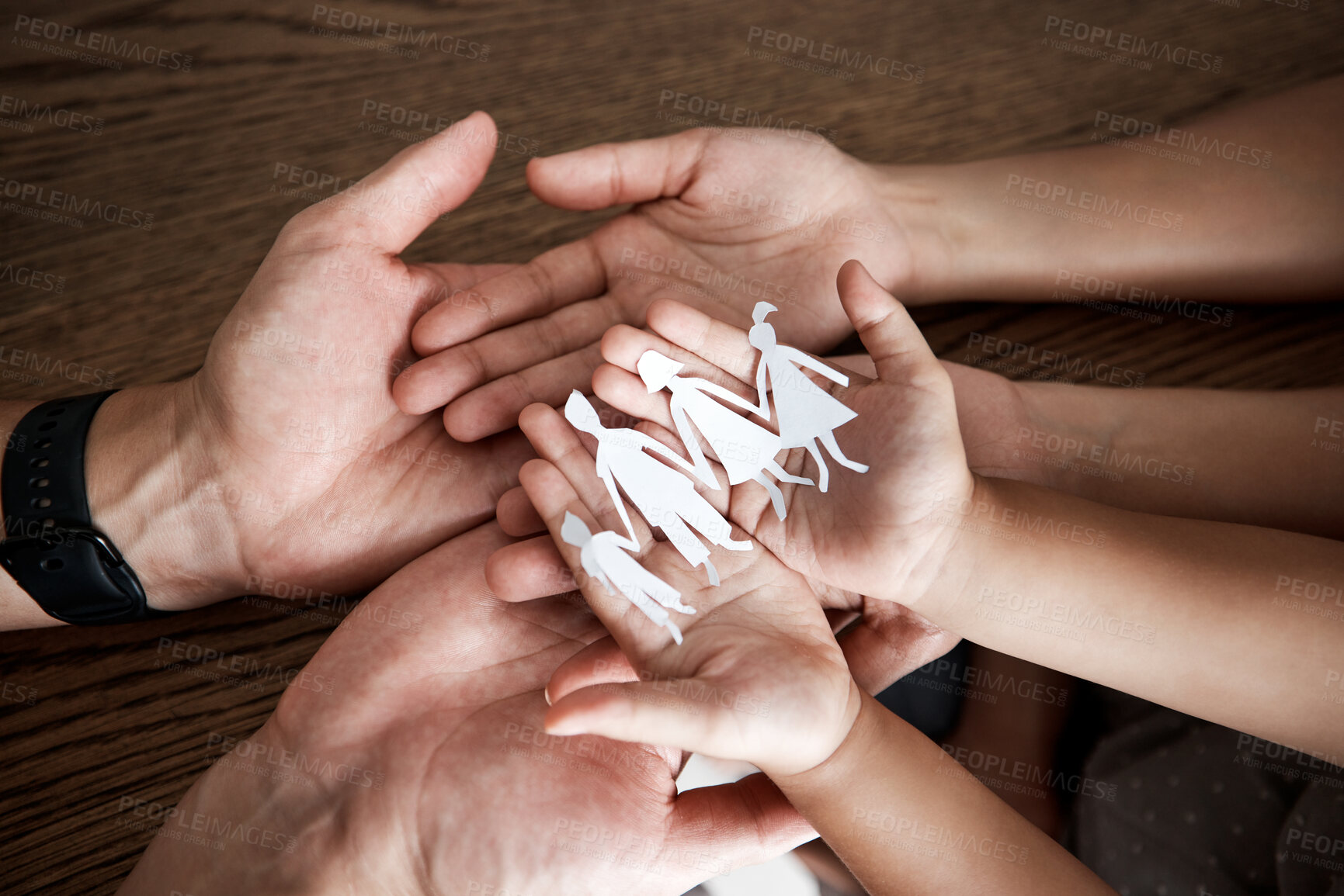 Buy stock photo Hands, paper cutout family and house on table for sign, symbol or icon of support, love and solidarity. Art design with mother, father and children together for safety, trust and insurance in home