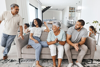 Buy stock photo Grandparents, parents and children in living room playing for bond, quality time and relax together. Big family, love and happy kids in action, running and fun with mom and dad, grandma and grandpa