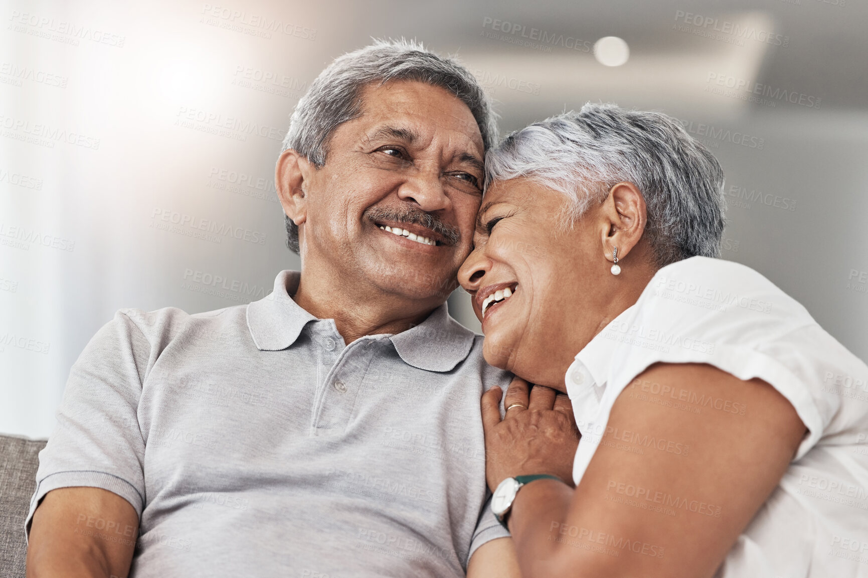 Buy stock photo Love, relax and senior couple laugh at funny joke, enjoy quality time together and bond on home living room sofa. Retirement, smile and elderly man, woman or people happy in Rio de Janeiro Brazil