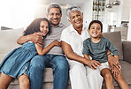 Home love, hug and portrait of happy family bonding, relax and enjoy quality time together in Rio de Janeiro Brazil. Smile, happiness and young youth children with grandparents on vacation house sofa