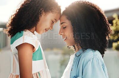 Buy stock photo Love, forehead and mother with daughter, outdoor and happiness on break, bonding and loving. Mama, female child and faces together with smile, quality time and kid with mom, relax and summer holiday