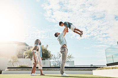 Buy stock photo Family, sky and real estate with a man lifting his son outdoor while bonding as a new homeowner group. Kids, love or summer with parents and children standing outside in the garden of a home property