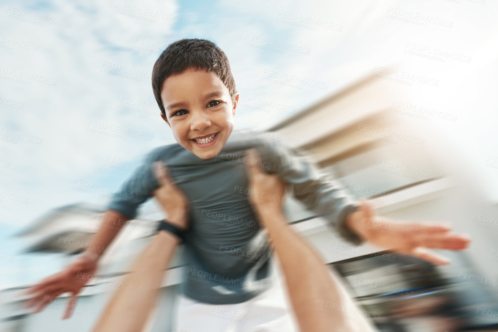 Buy stock photo Family, speed and portrait of boy in air enjoying playing outdoors on holiday, vacation and weekend. Motion blur, childhood and happy face of boy in parents arms for bonding, quality time and relax